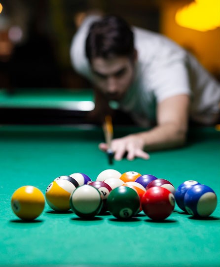 Competitive cuesports event in Singapore featuring pool and snooker matches